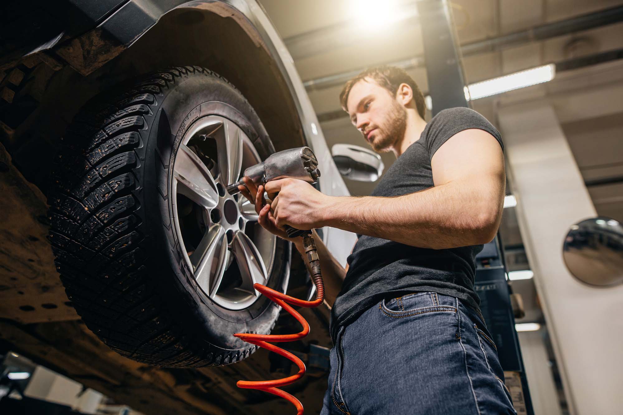 Man replacing tyre